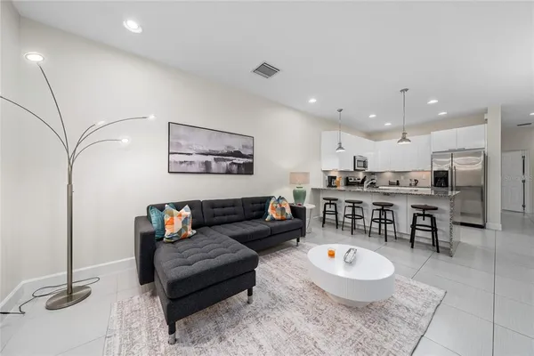 a living room with furniture and a table