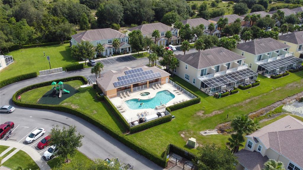17417 Placidity Avenue Clermont, FL 34714 - Photo 4 of 25 an aerial view of a house with garden space lake view and mountain view in back