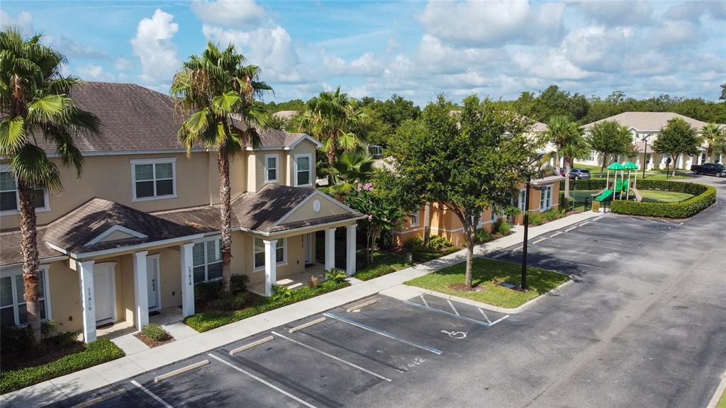 17417 Placidity Avenue Clermont, FL 34714 - Photo 7 of 25 a house that has a tree in front of it
