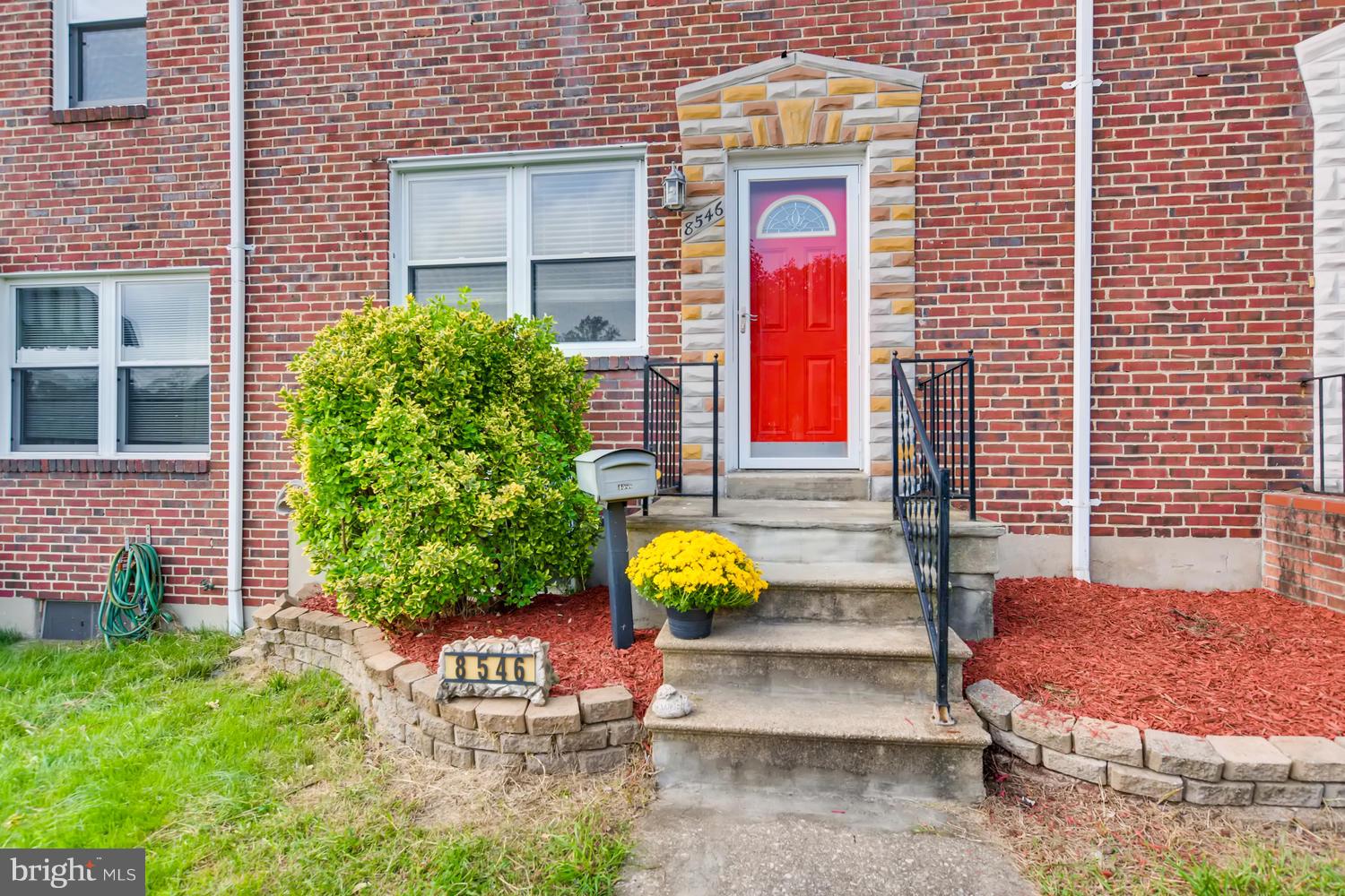 8546 Water Oak Road Baltimore, MD 21234 - Photo 2 of 28 a front view of a house with garden