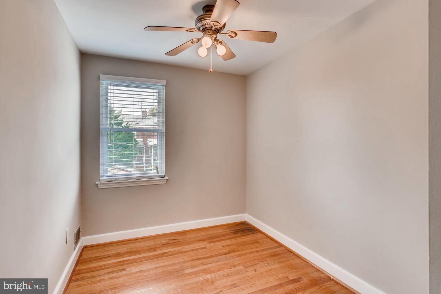 8546 Water Oak Road Baltimore, MD 21234 - Photo 16 of 28 a view of an empty room with a window
