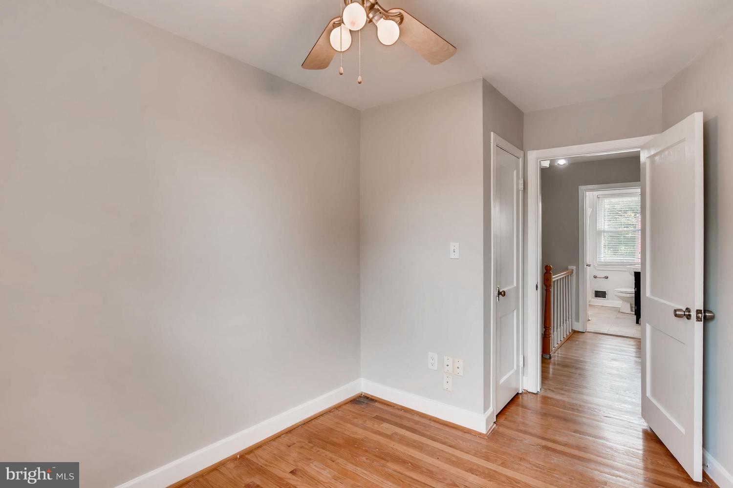 8546 Water Oak Road Baltimore, MD 21234 - Photo 17 of 28 a view of a room with wooden floor