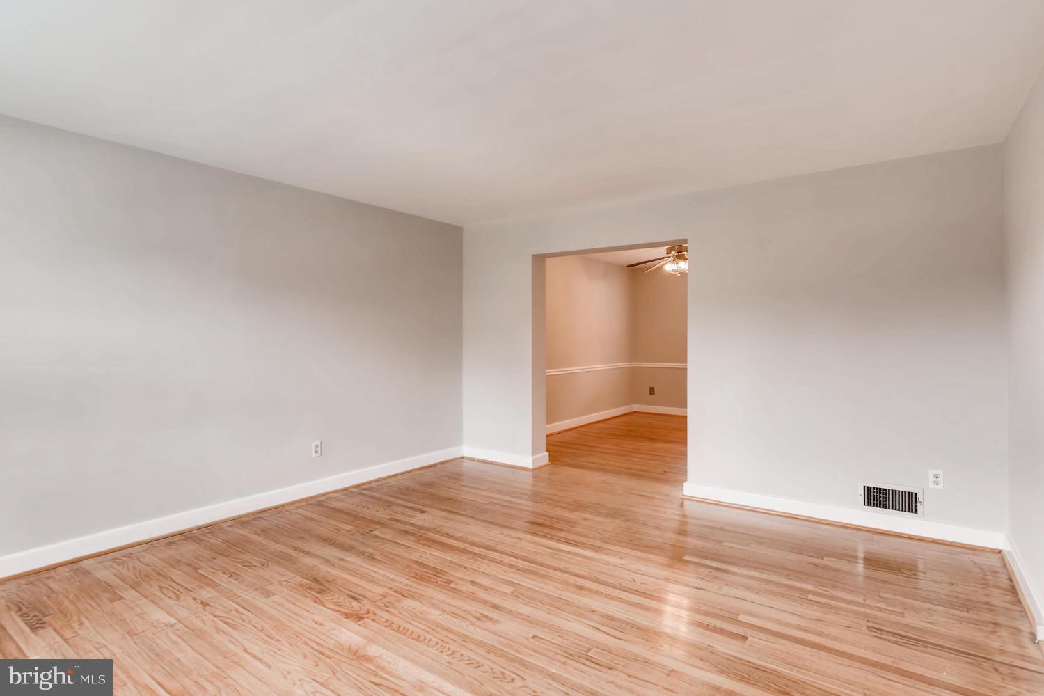 8546 Water Oak Road Baltimore, MD 21234 - Photo 3 of 28 a view of empty room with wooden floor