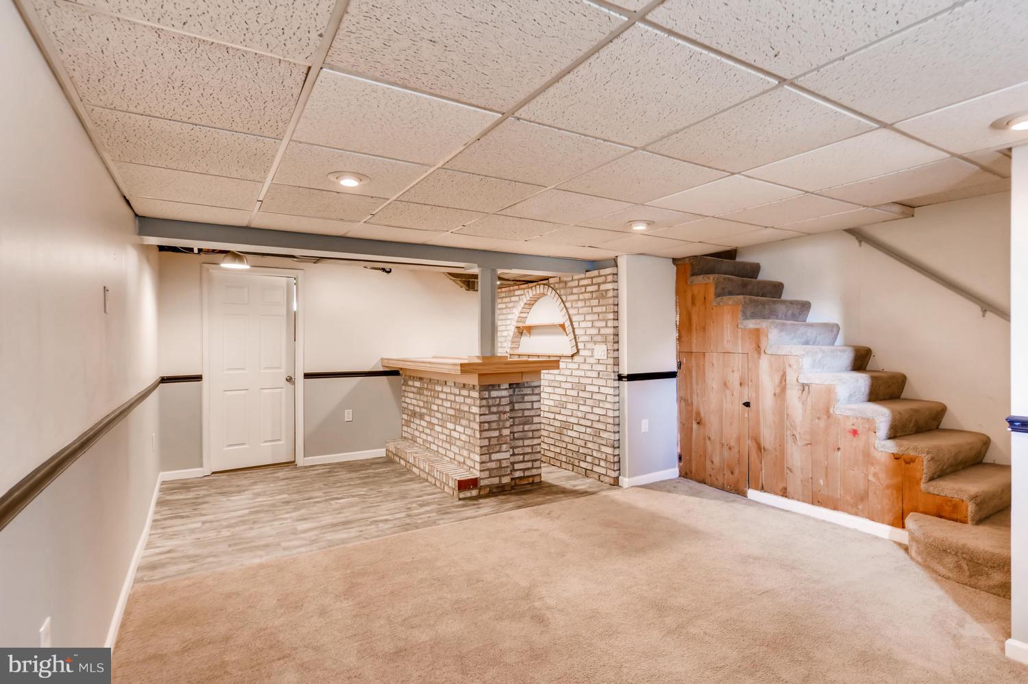 8546 Water Oak Road Baltimore, MD 21234 - Photo 22 of 28 a view of empty room with wooden walls