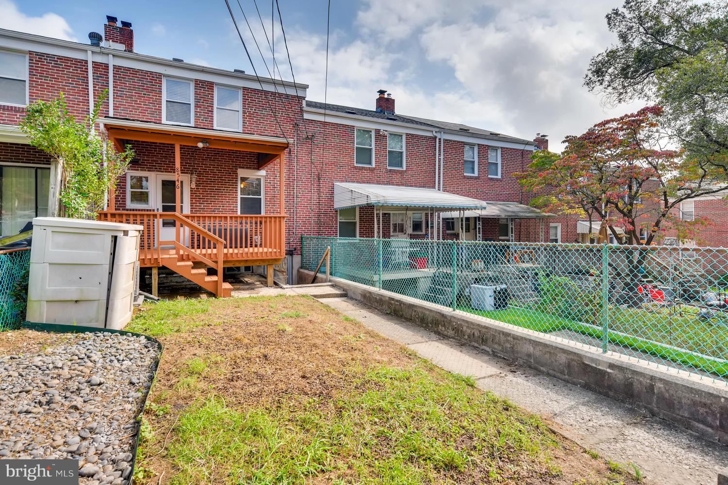 8546 Water Oak Road Baltimore, MD 21234 - Photo 28 of 28 a view of a house with a yard and potted plants