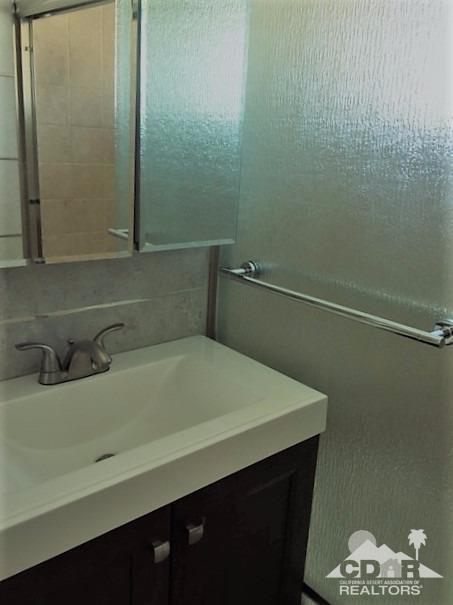 71547 Mirage Road Rancho Mirage, CA 92270 - Photo 12 of 17 a bathroom with a sink and a vanity