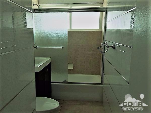 71547 Mirage Road Rancho Mirage, CA 92270 - Photo 13 of 17 a bathroom with a toilet and a shower