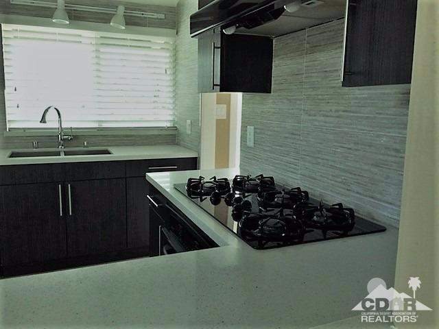 71547 Mirage Road Rancho Mirage, CA 92270 - Photo 9 of 17 a kitchen with a sink and cabinets