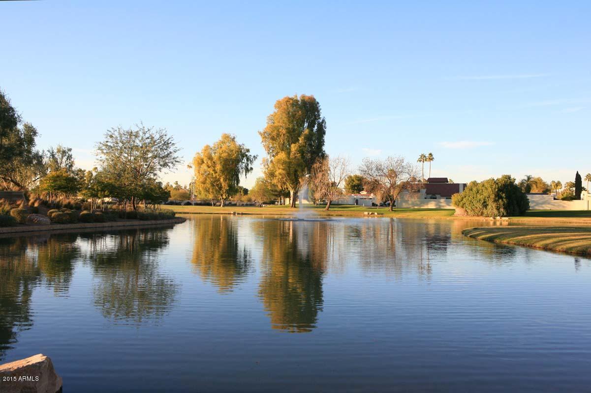 7249 East Maverick Road Scottsdale, AZ 85258 - Photo 24 of 26 a view of a lake with houses