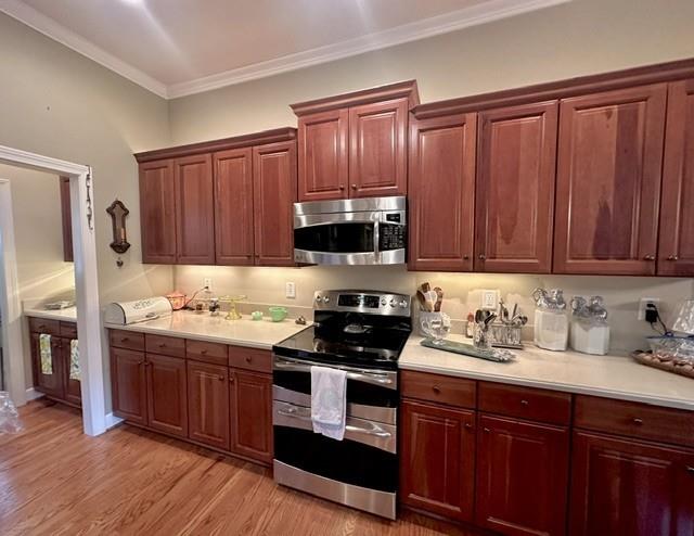 104 Willow Overlook Canton, GA 30115 - Photo 4 of 27 a kitchen with granite countertop wooden cabinets and a stove top oven