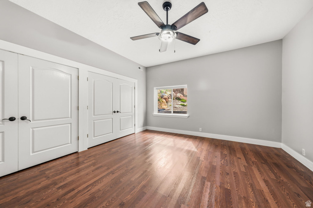 2154 Wasatch Boulevard Sandy, UT 84092 - Photo 23 of 32 Spacious interior with rich wood-finish flooring