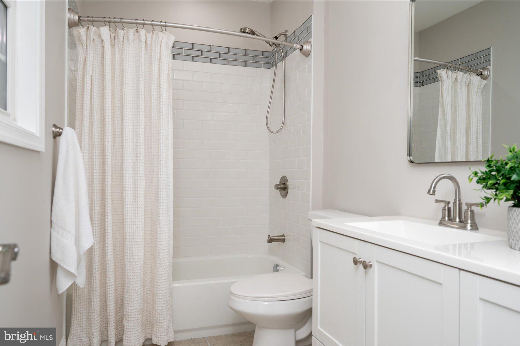 1400 Lower View Court Crownsville, MD 21032 - Photo 16 of 29 a bathroom with a sink toilet and shower