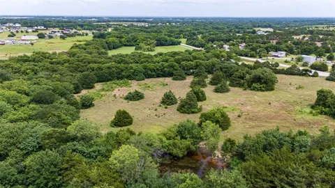 an aerial view of residential house with space view