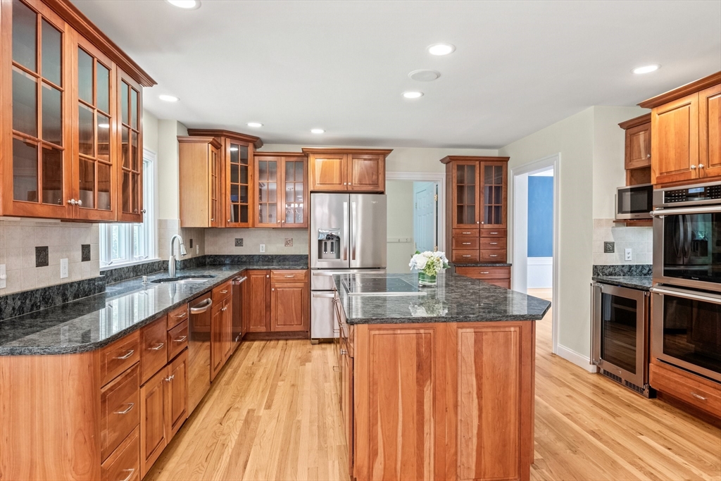 5 Main Sail Drive Sandwich, MA 02644 - Photo 11 of 33 a kitchen with stainless steel appliances granite countertop a stove and a sink
