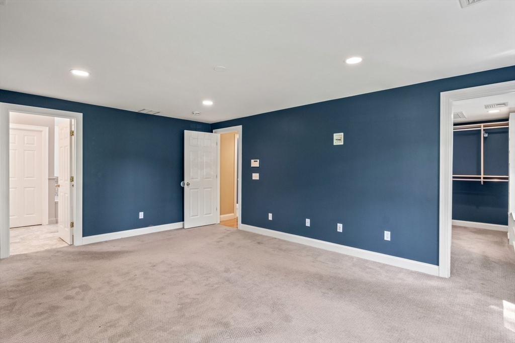 5 Main Sail Drive Sandwich, MA 02644 - Photo 17 of 33 a view of an empty room with glass door and stairs