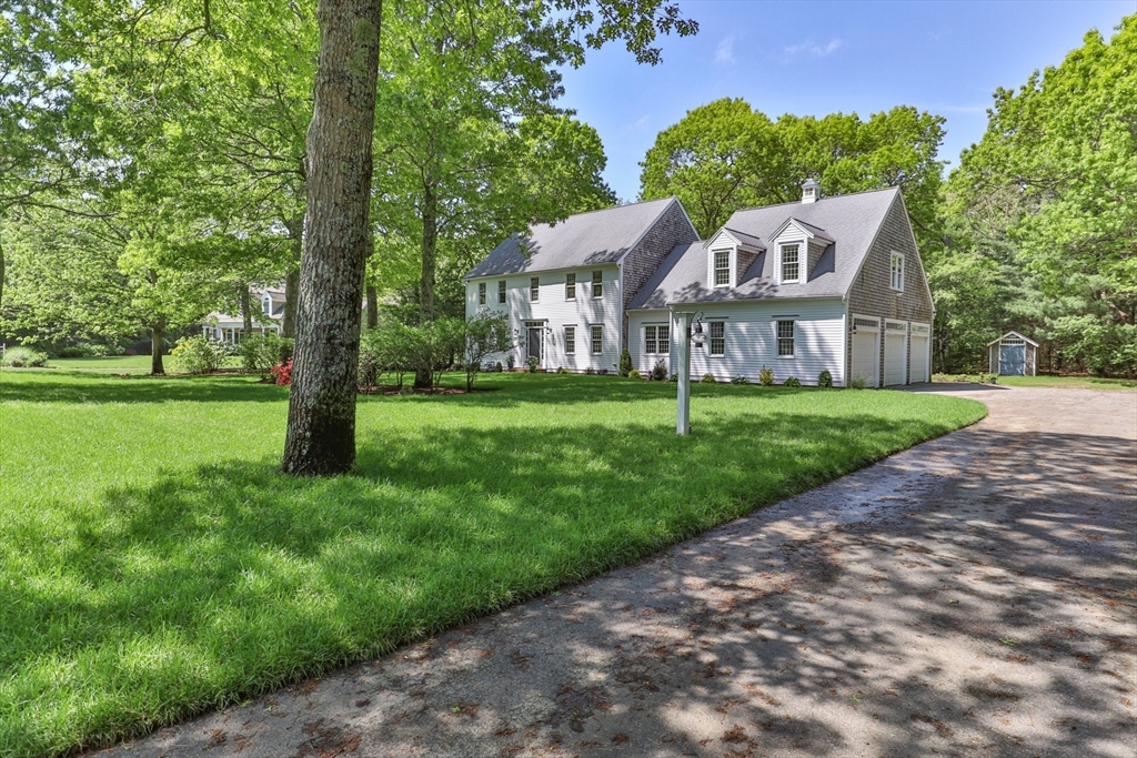 5 Main Sail Drive Sandwich, MA 02644 - Photo 3 of 33 a front view of a house with a yard