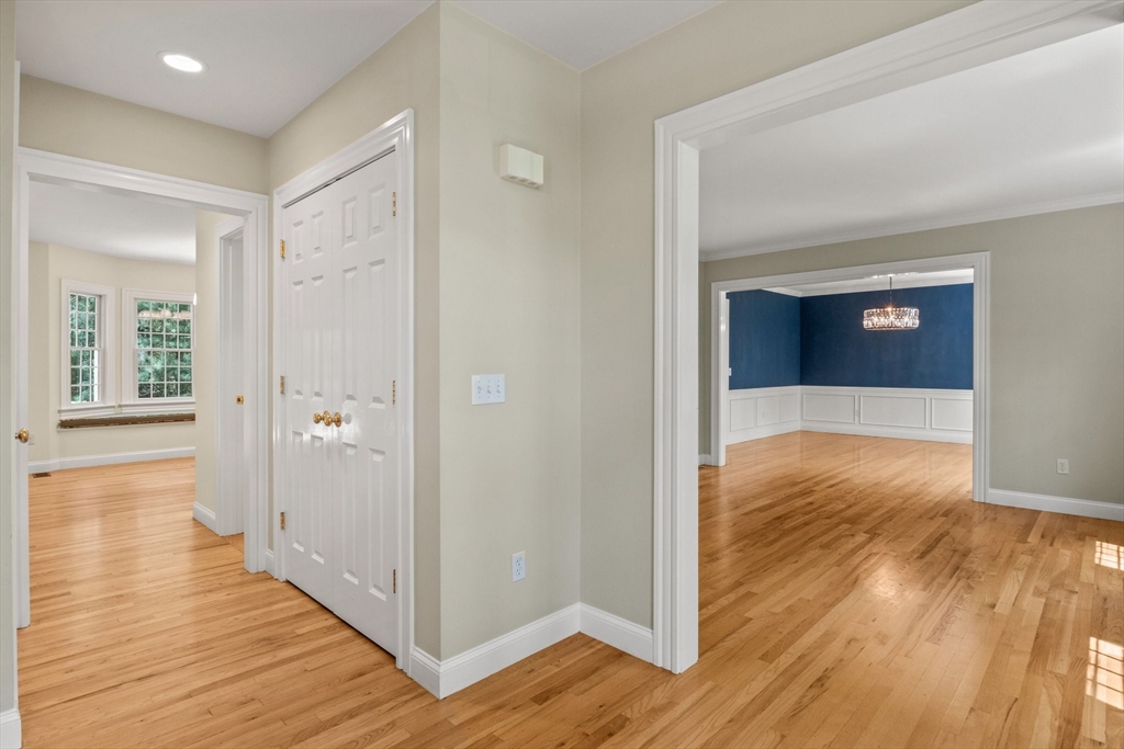 5 Main Sail Drive Sandwich, MA 02644 - Photo 5 of 33 a view of hallway with wooden floor