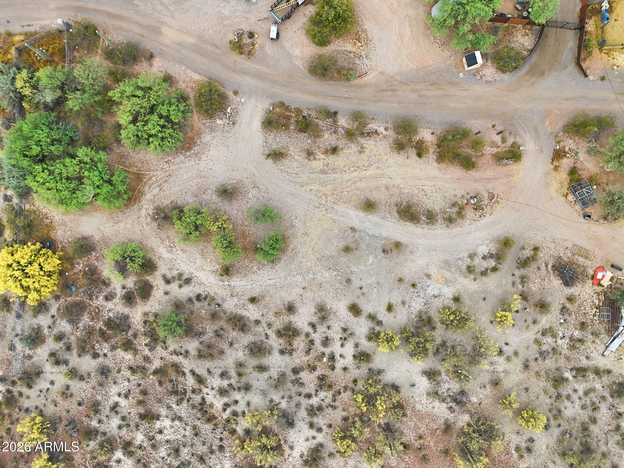 3532 West New River Road New River, AZ 85087 - Photo 13 of 16 a view of a dry yard with trees
