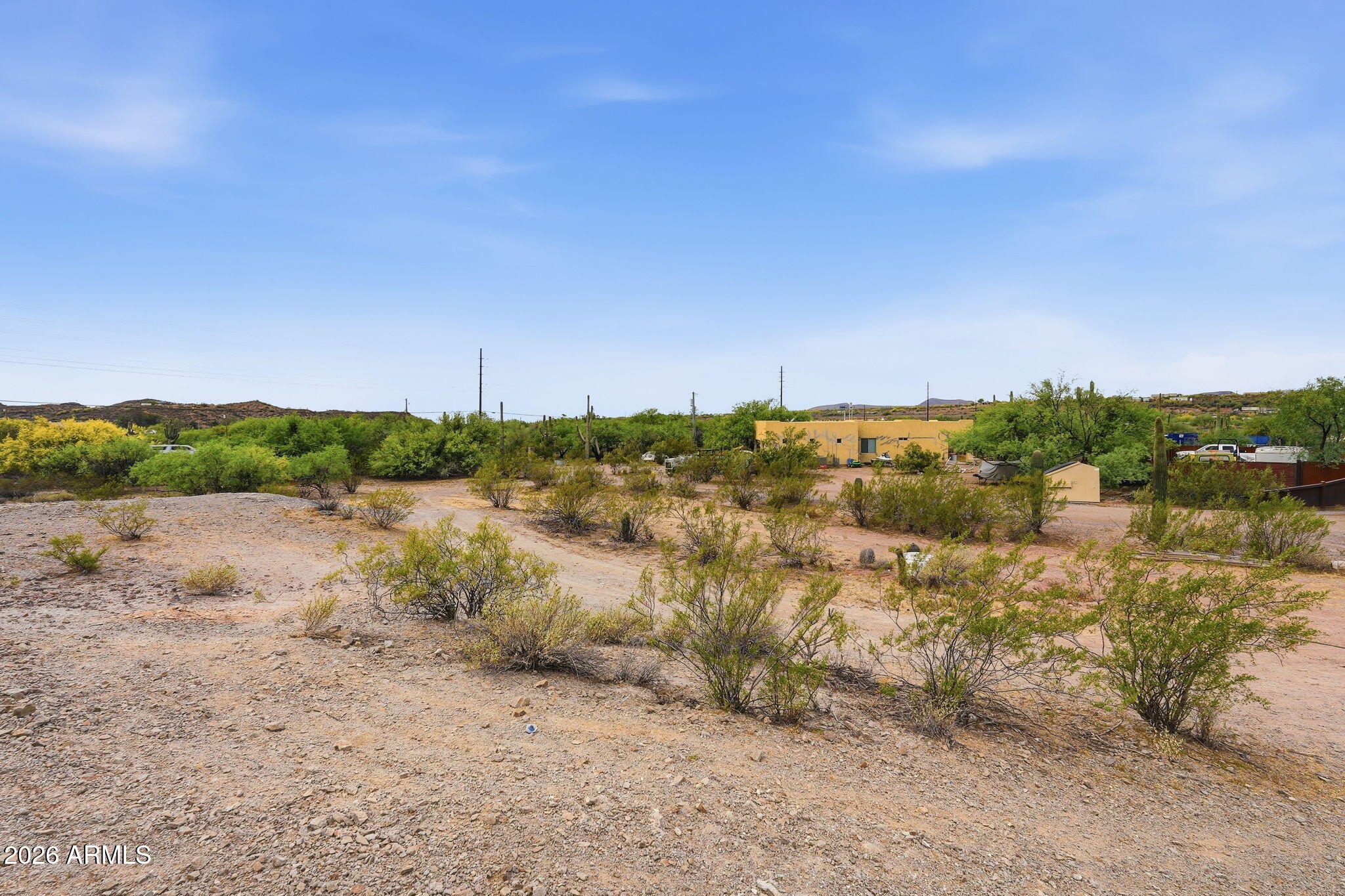 3532 West New River Road New River, AZ 85087 - Photo 4 of 16 a view of a lake with houses in the back