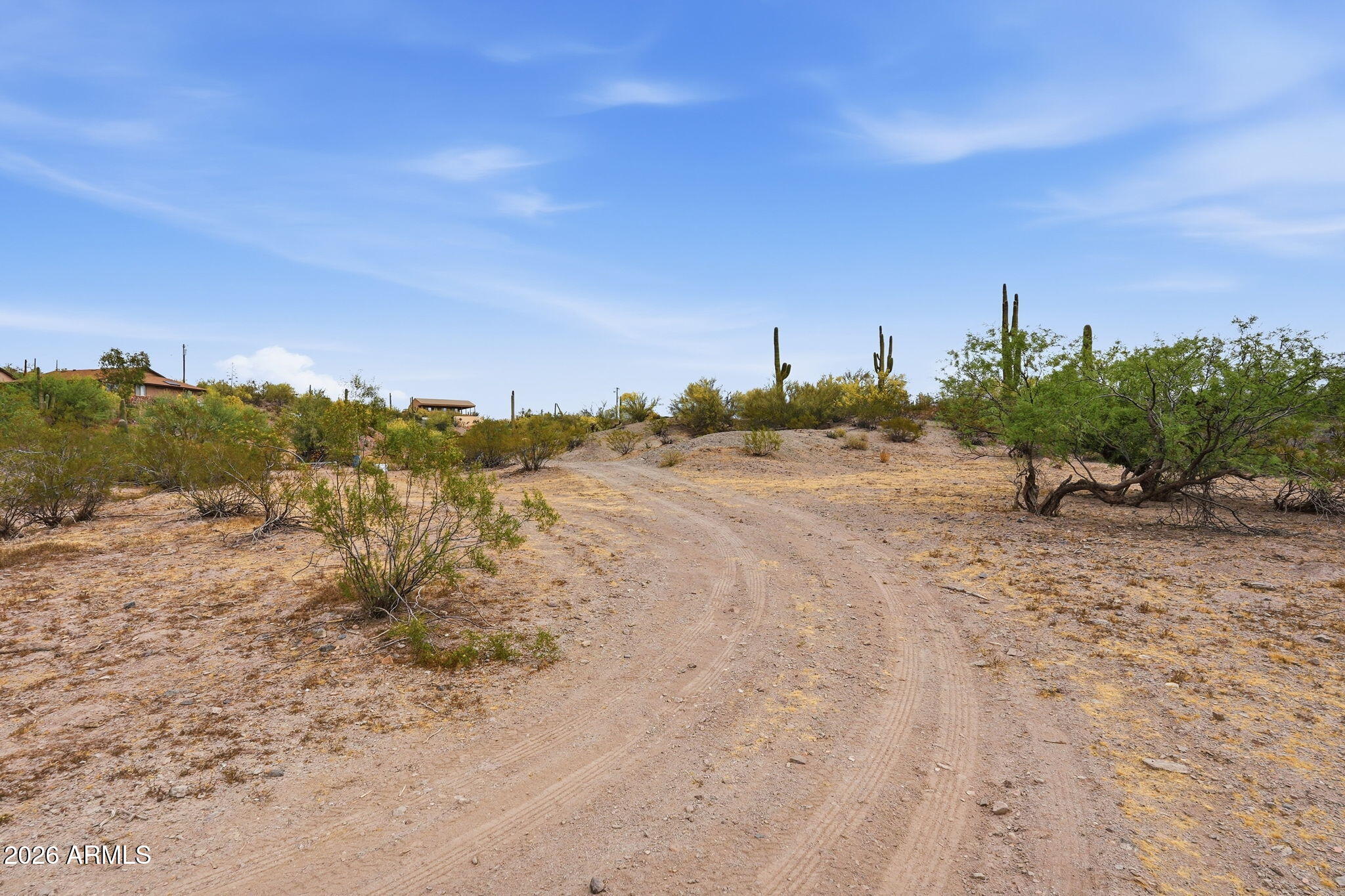 3532 West New River Road New River, AZ 85087 - Photo 5 of 16 a view of a beach with a building in the background