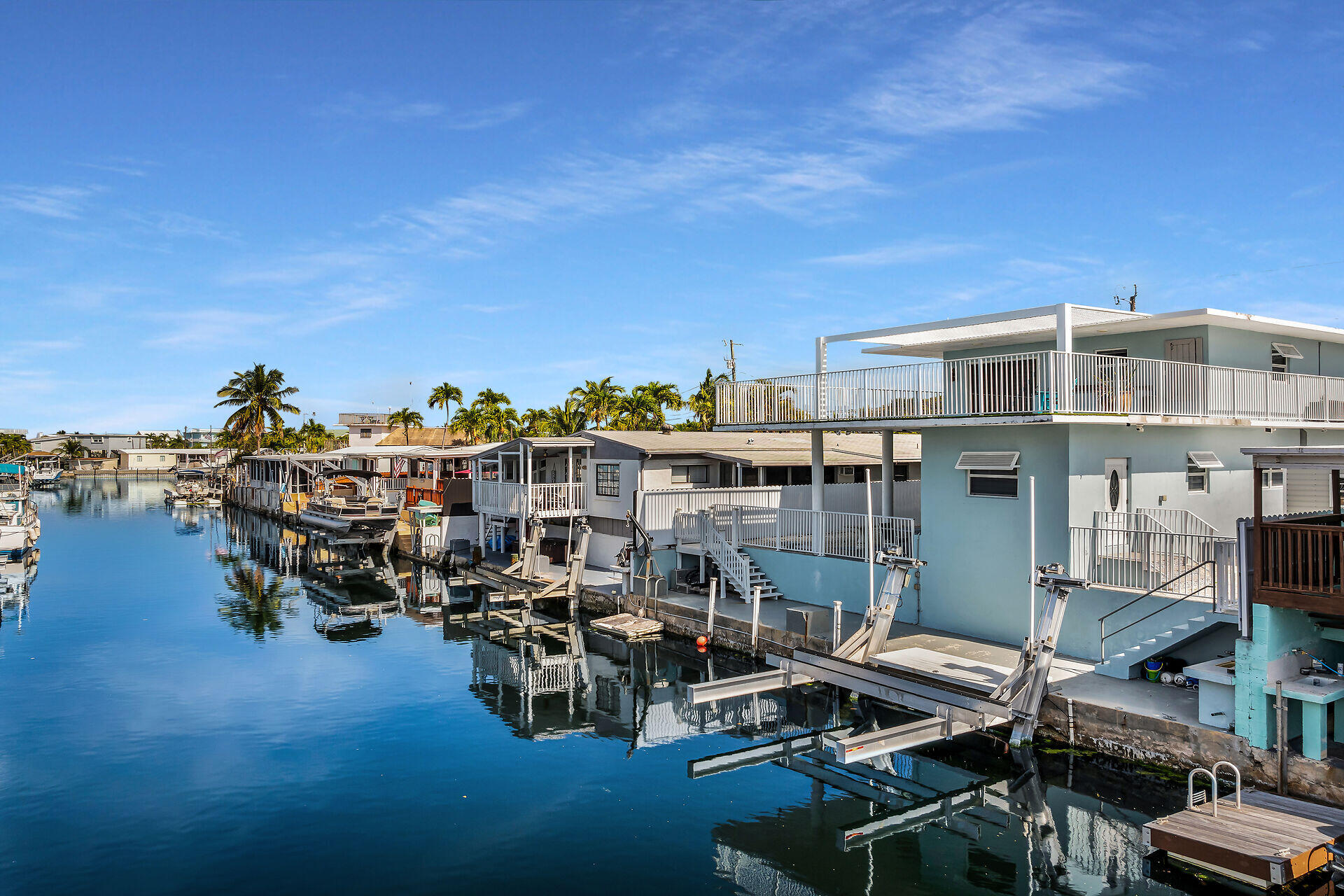 1007 Hialeah Lane Key Largo, FL 33037 - Photo 1 of 41 a view of a terrace with chairs