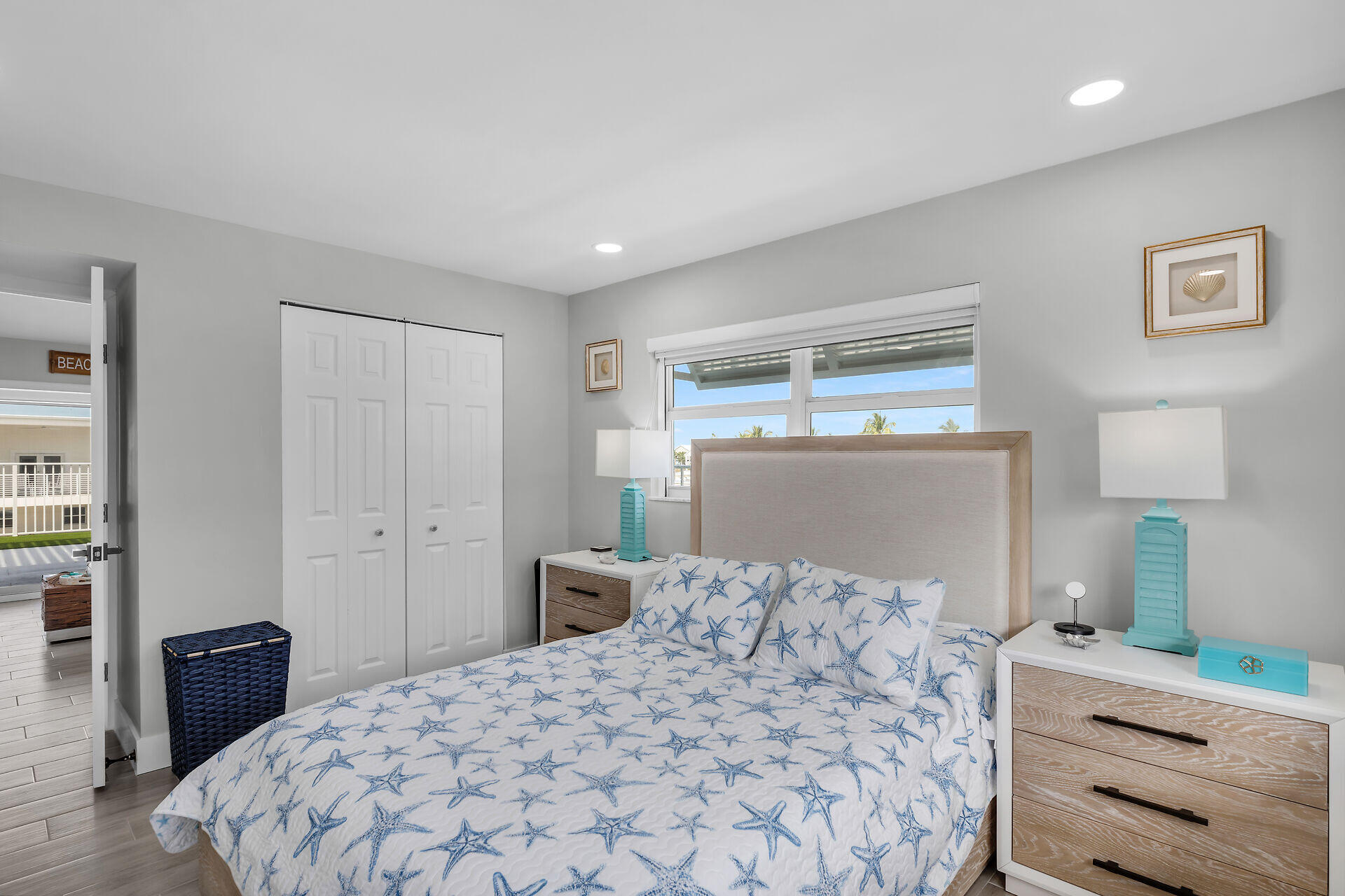 1007 Hialeah Lane Key Largo, FL 33037 - Photo 15 of 41 a bedroom with a bed and a dresser