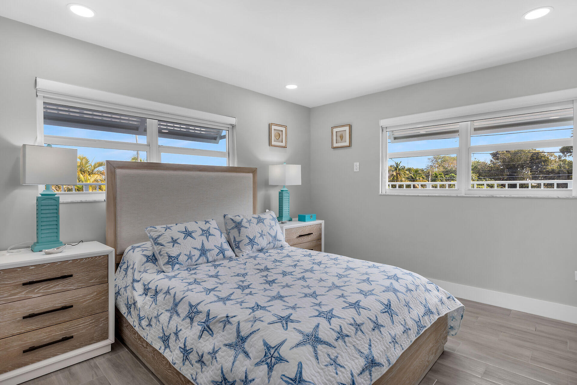 1007 Hialeah Lane Key Largo, FL 33037 - Photo 17 of 41 a bedroom with a large bed and a window