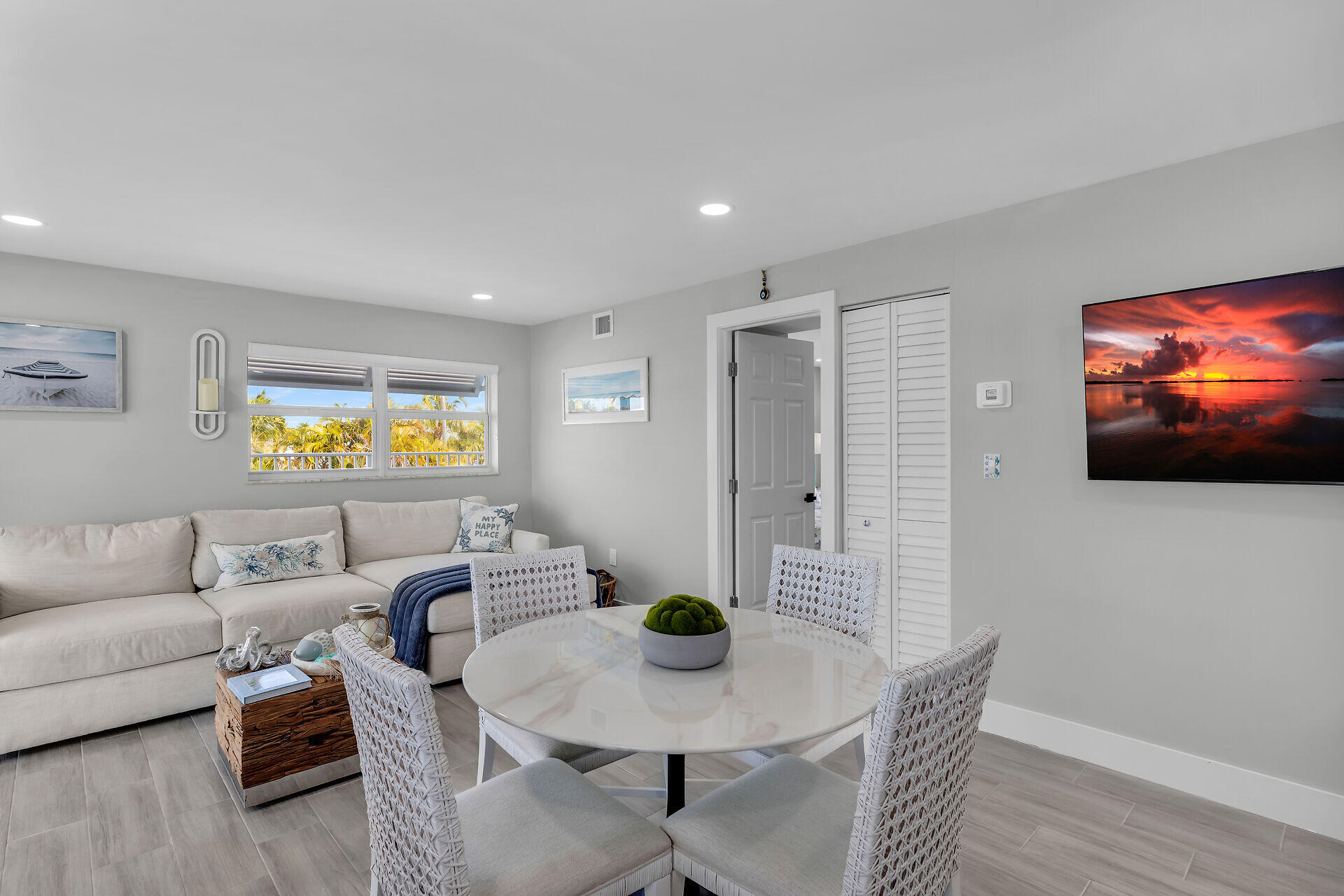 1007 Hialeah Lane Key Largo, FL 33037 - Photo 19 of 41 a living room with furniture and a flat screen tv
