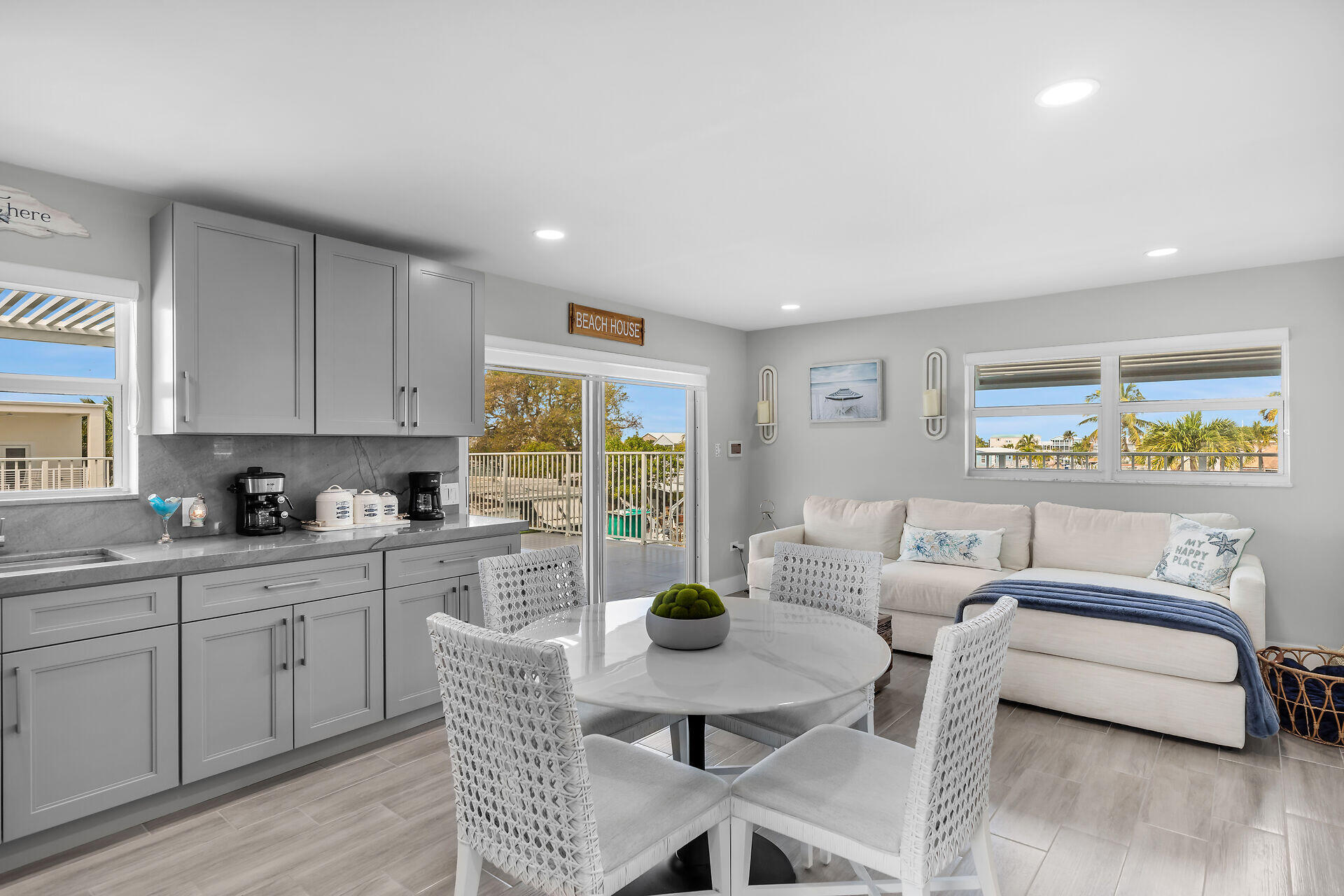 1007 Hialeah Lane Key Largo, FL 33037 - Photo 23 of 41 a living room with furniture and a large window