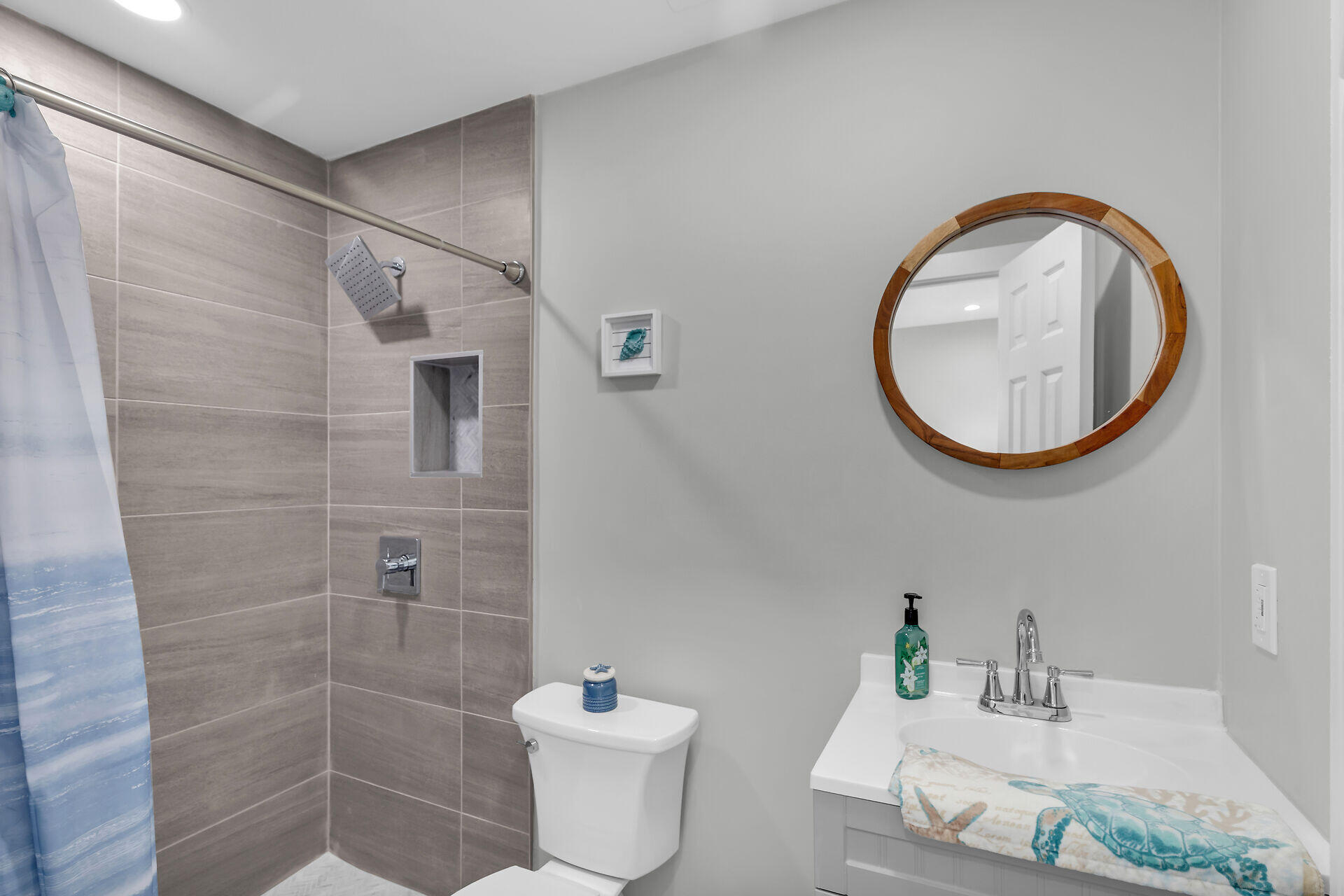 1007 Hialeah Lane Key Largo, FL 33037 - Photo 24 of 41 a bathroom with a toilet sink and mirror