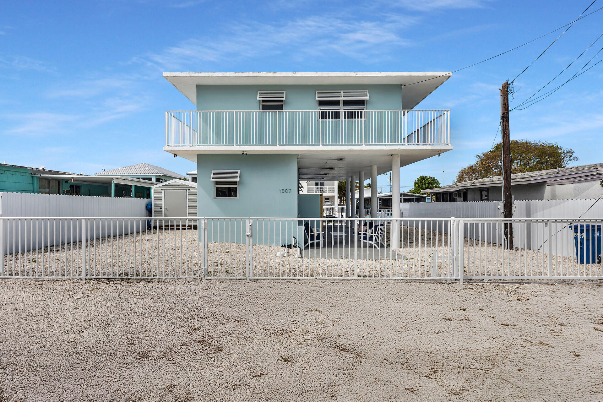 1007 Hialeah Lane Key Largo, FL 33037 - Photo 36 of 41 a view of a house with a yard