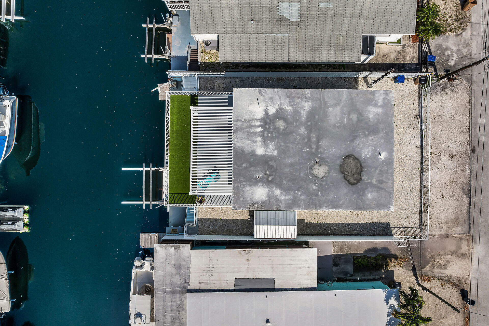 1007 Hialeah Lane Key Largo, FL 33037 - Photo 40 of 41 a bathroom with a sink and a mirror