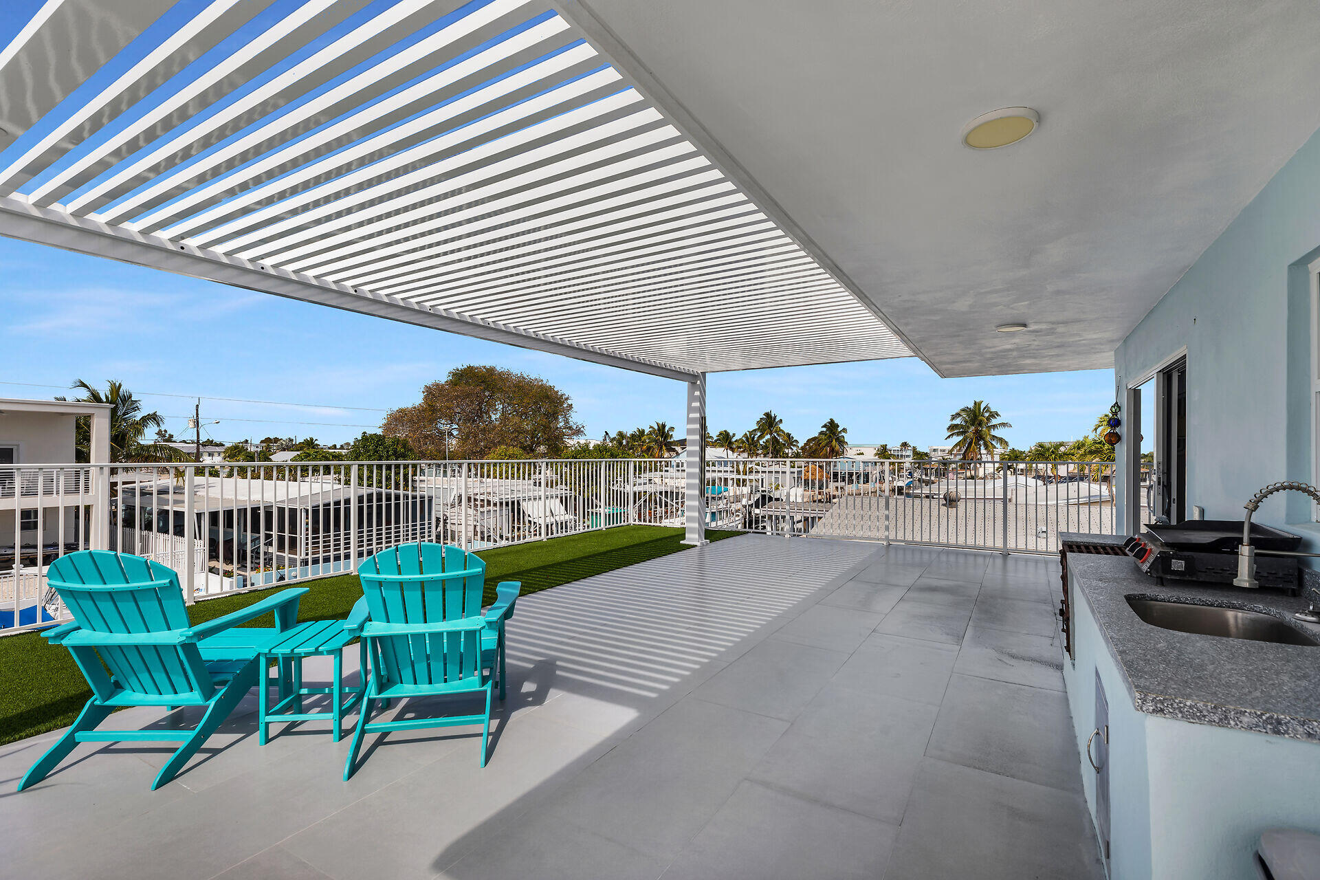 1007 Hialeah Lane Key Largo, FL 33037 - Photo 8 of 41 a view of a chairs and table in patio
