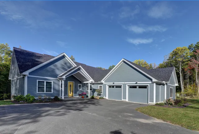 front view of a house with a street