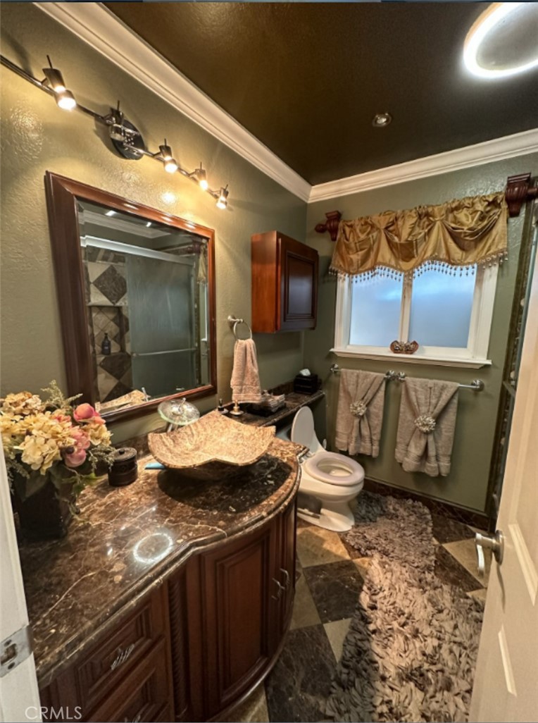 48 Jeanette Way Watsonville, CA 95076 - Photo 7 of 14 a living room with granite countertop furniture and a flat screen tv