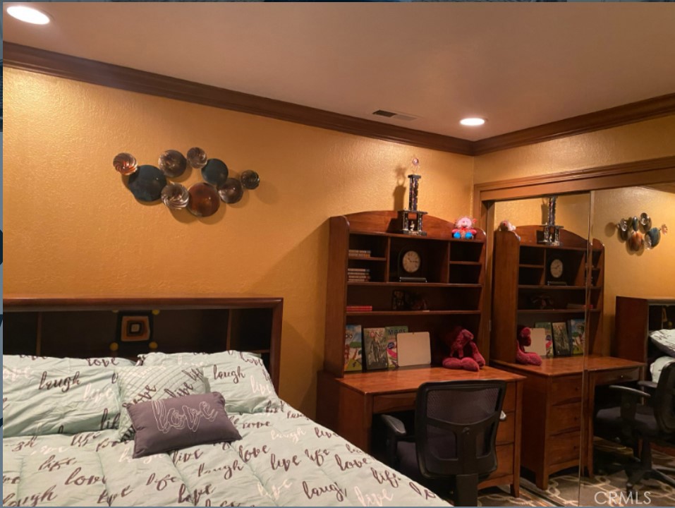 48 Jeanette Way Watsonville, CA 95076 - Photo 8 of 14 a bedroom with a bed and a desk