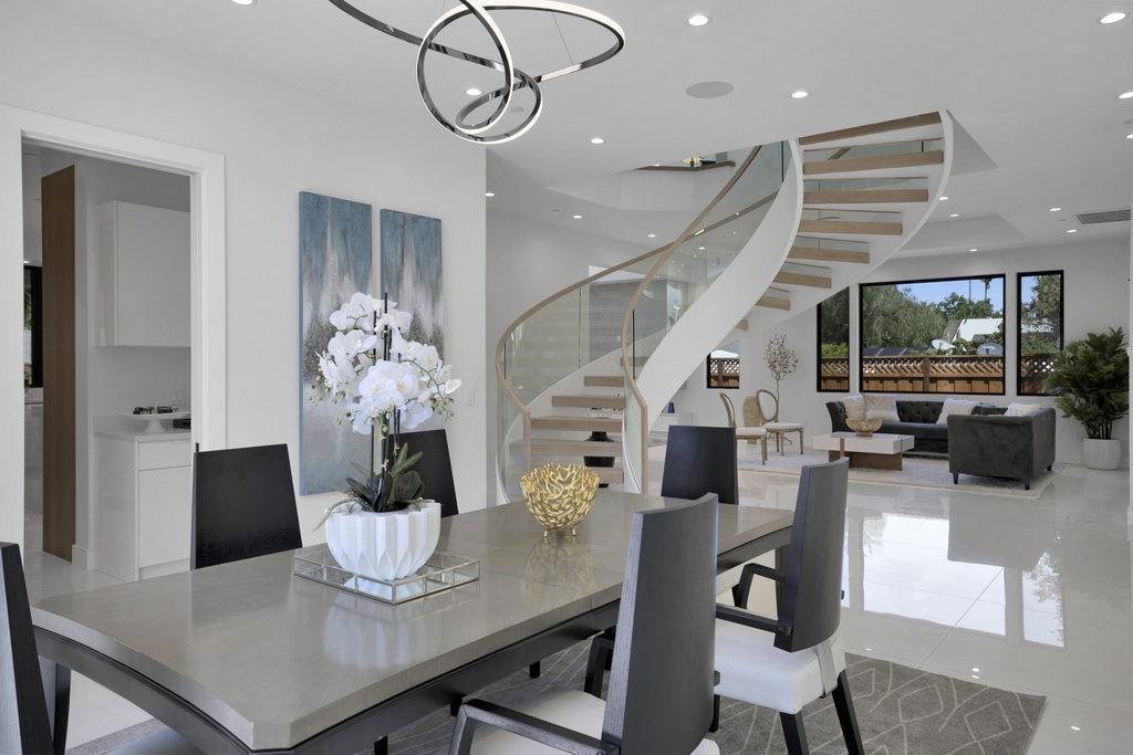 729 Filbert Avenue Campbell, CA 95008 - Photo 14 of 56 a view of a dining room with furniture a potted plant and wooden floor