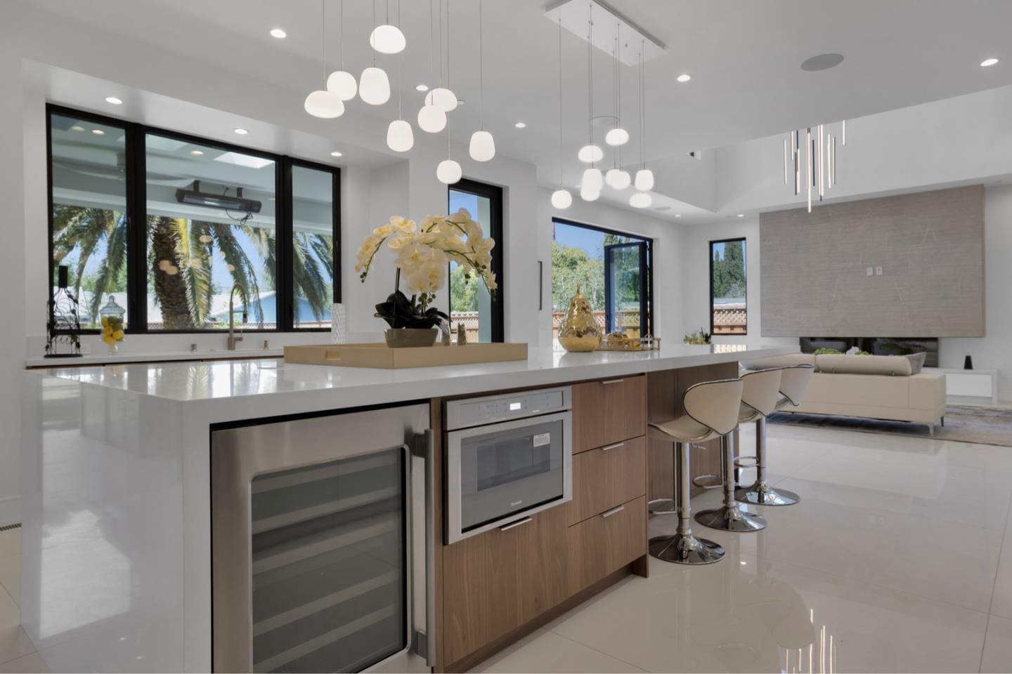 729 Filbert Avenue Campbell, CA 95008 - Photo 17 of 56 a kitchen with kitchen island a counter top space a sink stainless steel appliances and cabinets