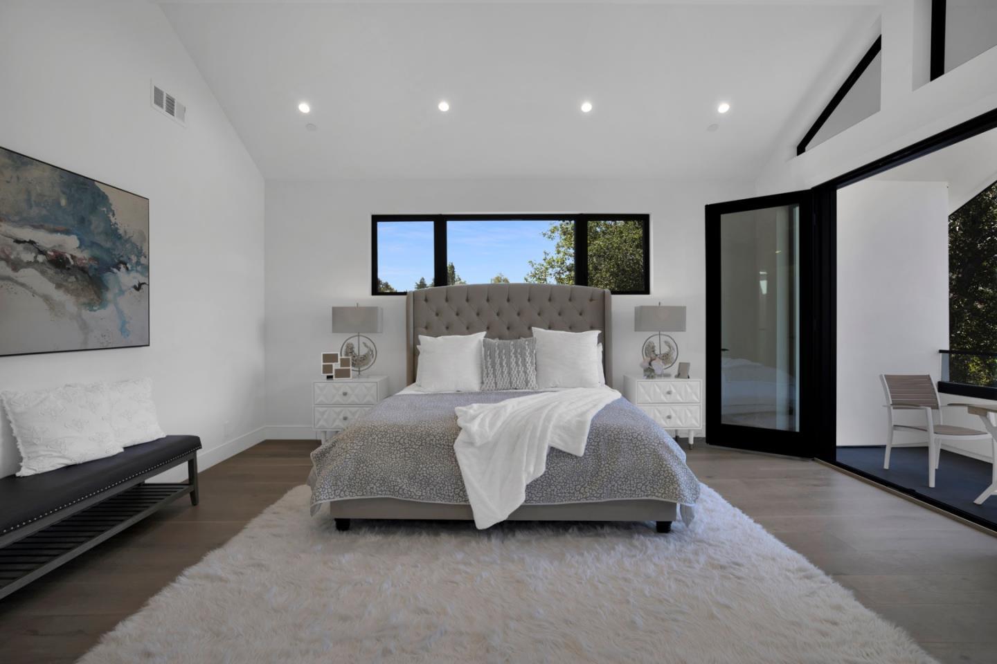 729 Filbert Avenue Campbell, CA 95008 - Photo 23 of 56 a spacious bedroom with a bed and a couch