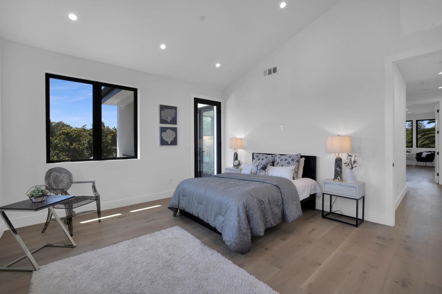 729 Filbert Avenue Campbell, CA 95008 - Photo 30 of 56 a spacious bedroom with a large bed and a window