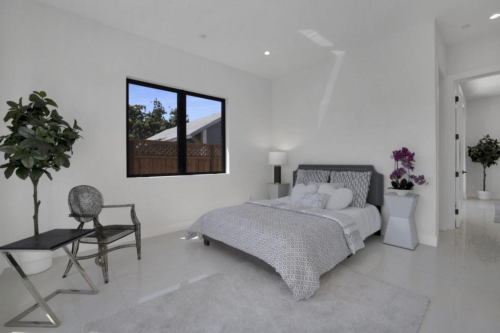 729 Filbert Avenue Campbell, CA 95008 - Photo 34 of 56 a bedroom with a bed and a potted plant