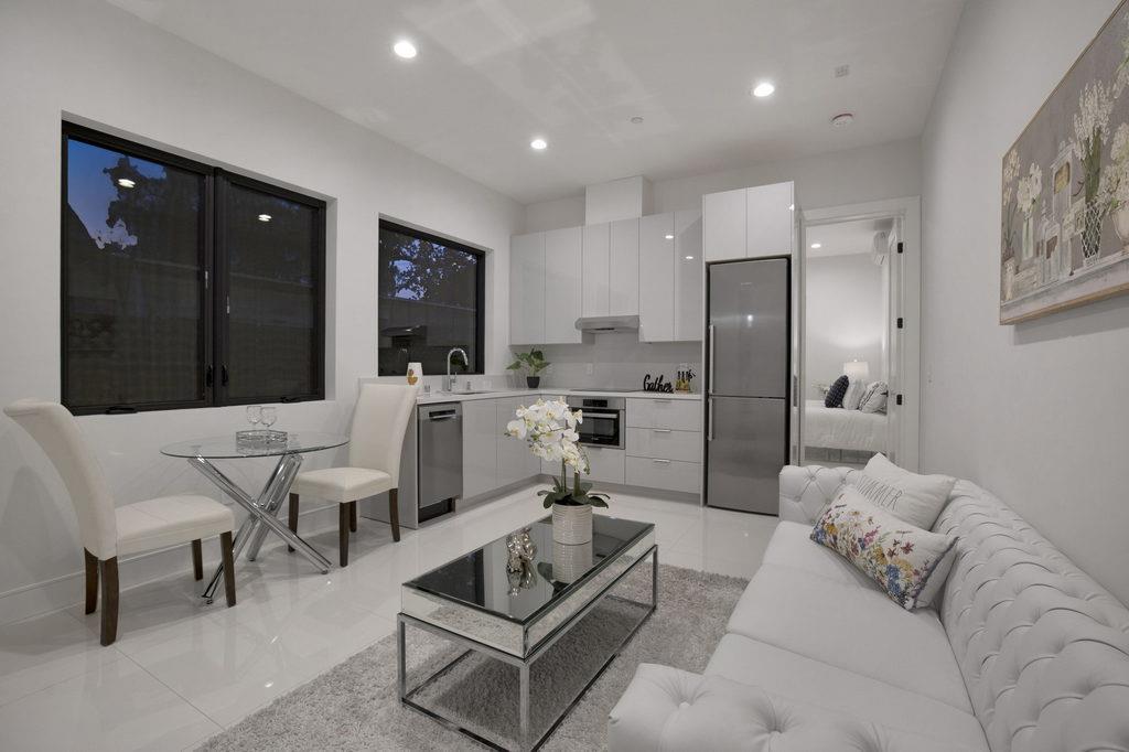 729 Filbert Avenue Campbell, CA 95008 - Photo 36 of 56 a living room with furniture and a flat screen tv