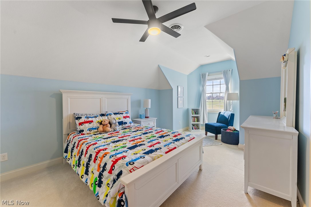 6716 Kyle Ridge Pointe Canfield, OH 44406 - Photo 31 of 43 Carpeted bedroom with vaulted ceiling and ceiling fan