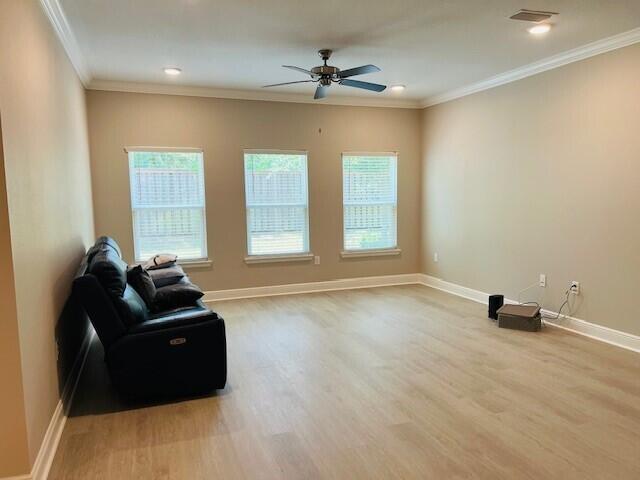 201 Lightning Bug Lane, Unit LOT 58 Freeport, FL 32439 - Photo 15 of 40 a living room with furniture and a window