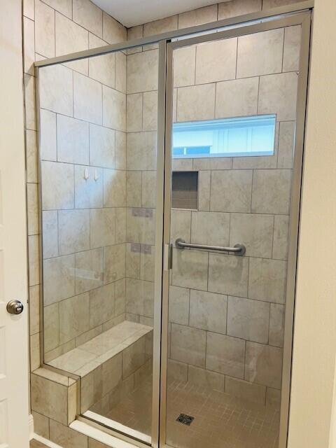 201 Lightning Bug Lane, Unit LOT 58 Freeport, FL 32439 - Photo 19 of 40 a bathroom with a shower and a sink