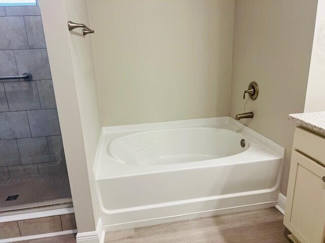 201 Lightning Bug Lane, Unit LOT 58 Freeport, FL 32439 - Photo 20 of 40 a bathroom with a bathtub