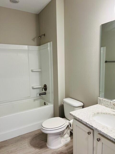 201 Lightning Bug Lane, Unit LOT 58 Freeport, FL 32439 - Photo 24 of 40 a white toilet sitting next to a bath tub
