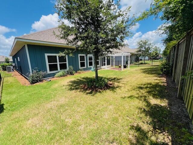 201 Lightning Bug Lane, Unit LOT 58 Freeport, FL 32439 - Photo 3 of 40 a front view of house with yard and green space