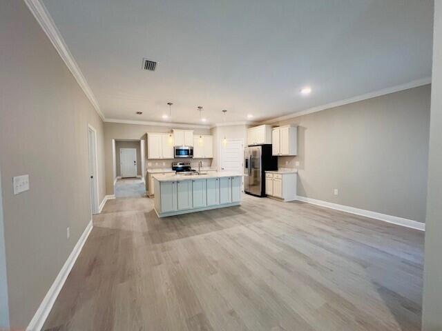 201 Lightning Bug Lane, Unit LOT 58 Freeport, FL 32439 - Photo 8 of 40 a view of a kitchen with a sink and a refrigerator