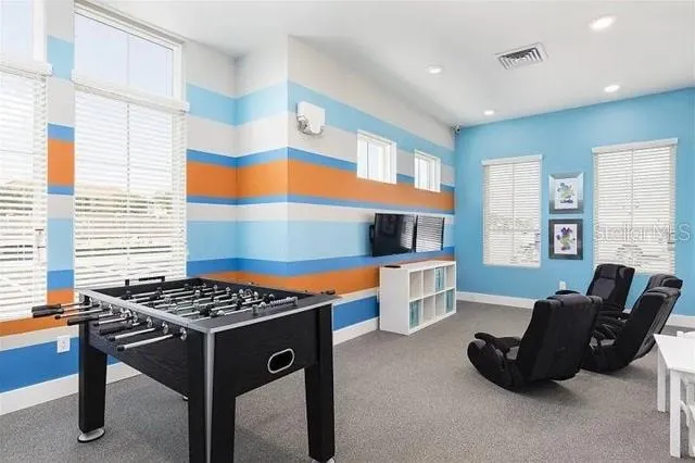 a kitchen with a sink cabinets and window